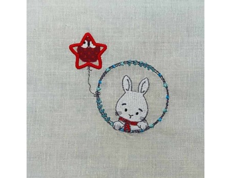 Motif de broderie machine lapin garçon avec son ballon étoile en appliqué