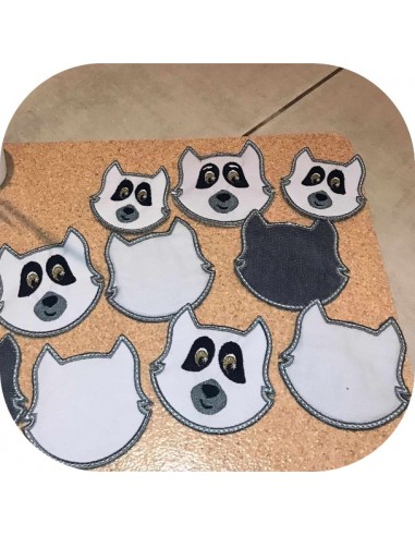 machine embroidery design ith reusable racoon head cotton wipes