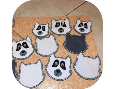 machine embroidery design ith reusable racoon head cotton wipes